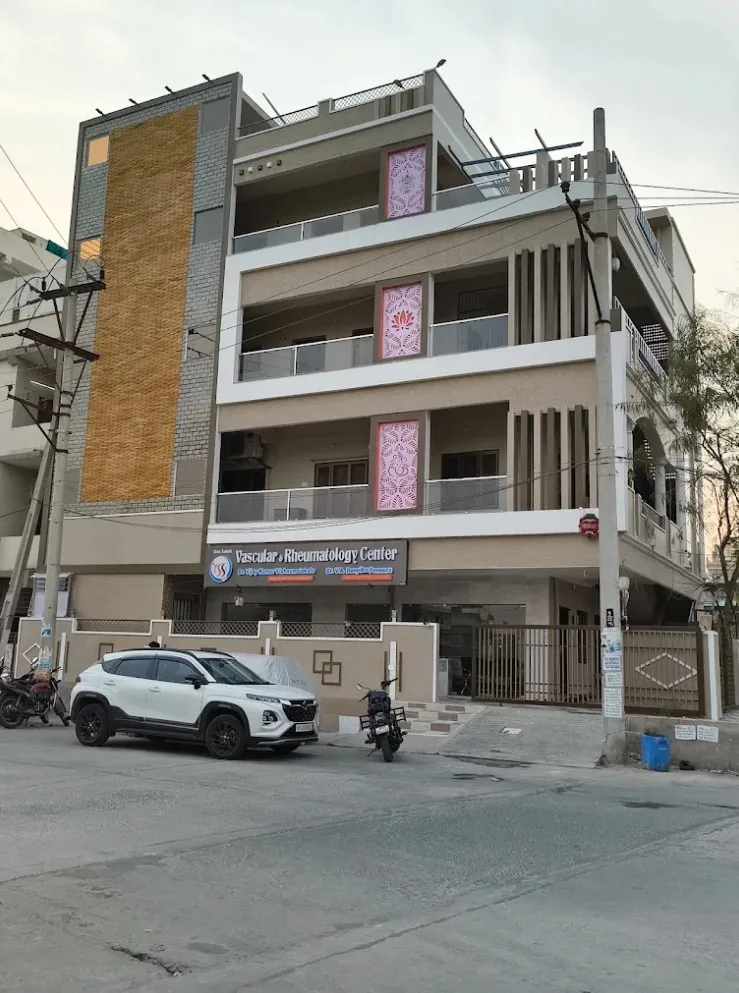 Exterior of Siva Sakthi Vascular & Rheumatology Center on 60 Feet Road, Kothapeta, Guntur, showing the clinic signage