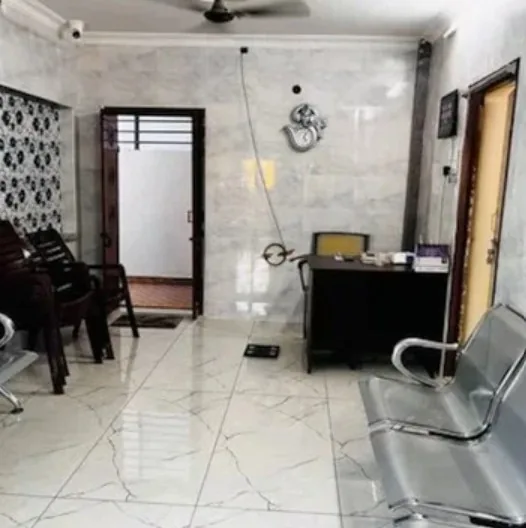 Reception desk and patient waiting area at Siva Sakthi Vascular & Rheumatology Center, Kothapeta, Guntur
